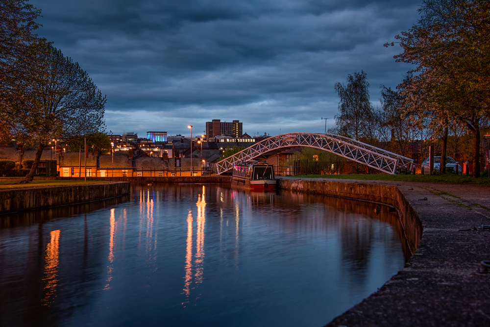 A night shot of the cauldon canal with a bridge crossing at Etruria, Stoke on trent