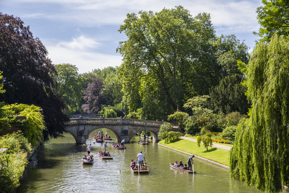 A picturesque view of Clare Bridge over the River Cam in Cambridge, UK