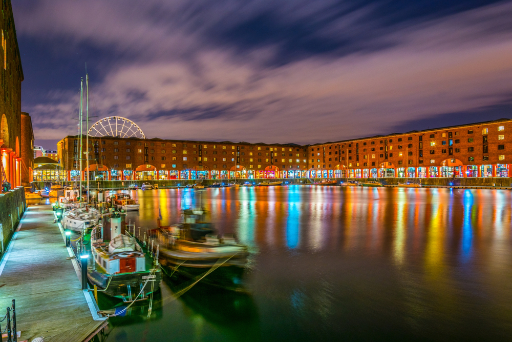 Night view of illuminated albert dock in Liverpool, England