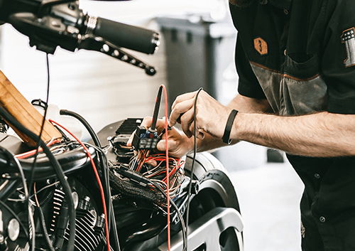 Mechanic working on a motorbike